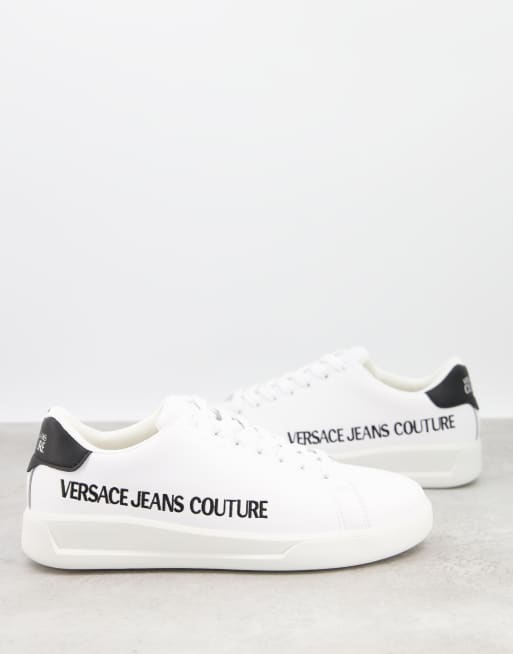 Sneakers basse versace on sale jeans