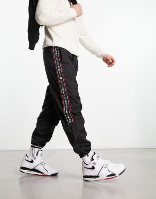 Versace Jeans Couture taping nylon joggers in black - ASOS Price Checker