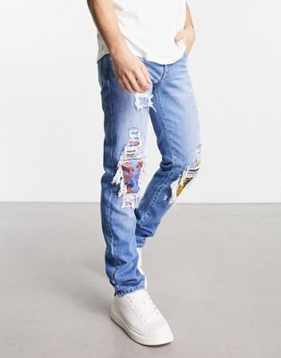 Versace Jeans Couture ripped patch jeans in blue