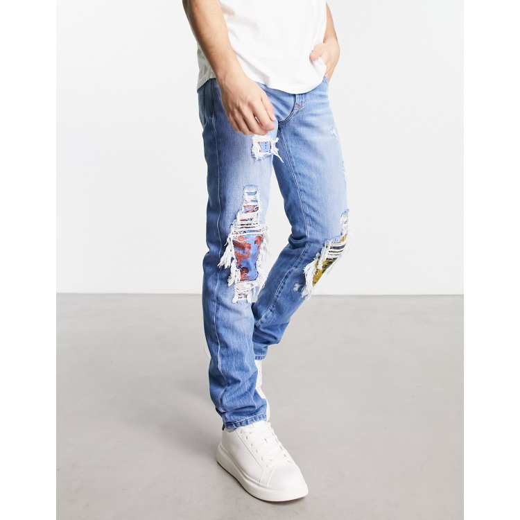 Versace Jeans Couture ripped patch jeans in blue