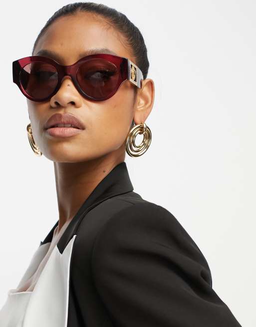 Versace Lunettes de soleil rondes oversize Rouge ASOS