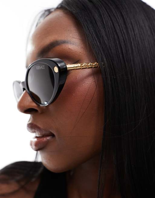 Versace Lunettes de soleil yeux de chat a monture fine en metal Noir et dore ASOS