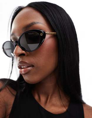 Versace Versace metal slim cat eye sunglasses in black and gold