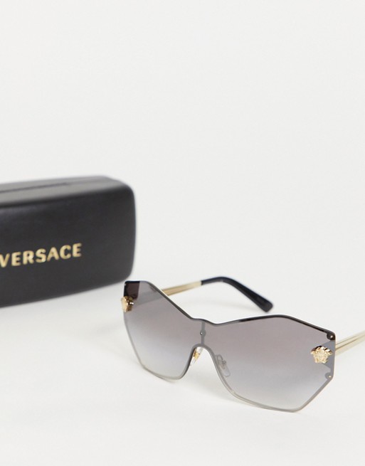 Versace rimless hexagonal sunglasses in black and gold