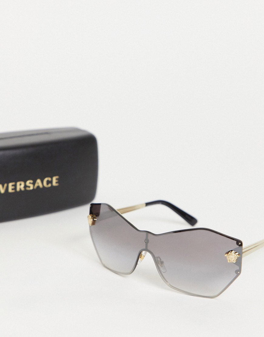 Versace - Zeshoekige zonnebril zonder rand in zwart en goud