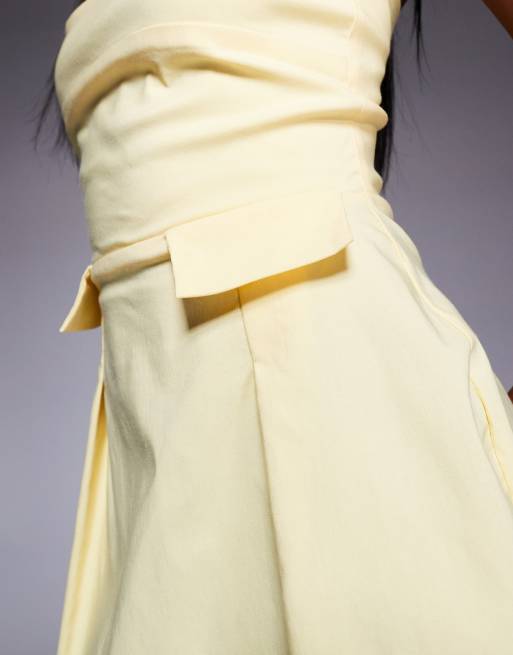 Vesper bengaline bandeau pleat front pocket detail mini dress in yellow, 3 of 4