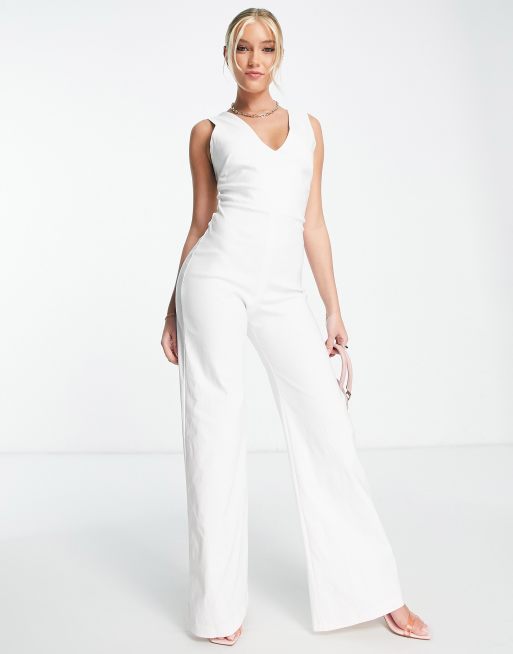 Vesper - Tuta jumpsuit bianca con fondo ampio e scollo profondo sul davanti