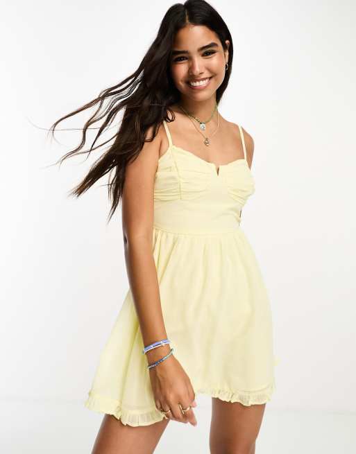 Vestido amarillo estilo corsé con volantes de Hollister