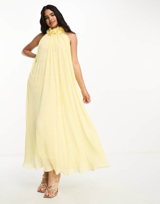 opción Definir monte Vesubio Vestido amarillo plisado con detalle tipo ramillete, cuello alto y lazada  trasera de ASOS DESIGN | ASOS