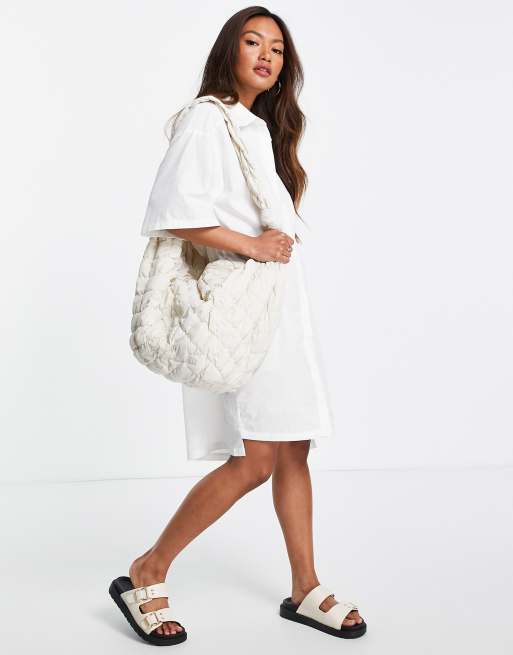Vestido camisero blanco con botones en la parte delantera de Mango