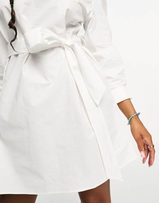 Vestido camisero blanco con cintura ceñida y lazada de Mango ASOS