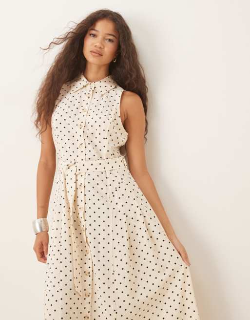 Vestido camisero midi blanco sin mangas con estampado de lunares
