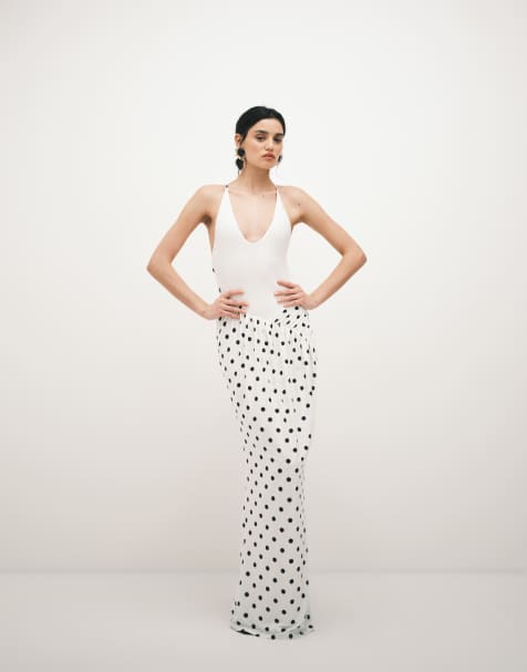 Vestido ceñido con diseño efecto dos en uno de top de tirantes y falda cruzada con estampado de lunares de ASOS DESIGN - view 1