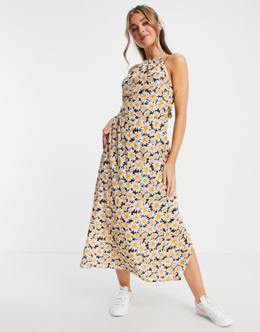 Vestido con cuello halter, lazada trasera y estampado de margaritas de Cotton:On