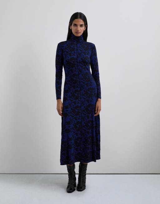 Vestido con estampado animal y detalles remallados de Scalpers