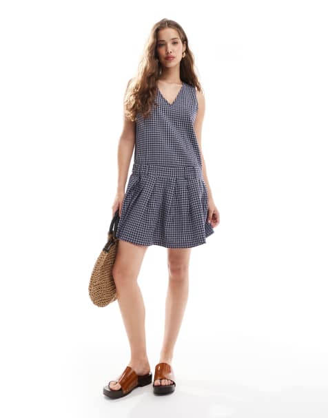Vestido corto a cuadros vichy azul marino con falda plisada y cintura baja de ONLY - view 1