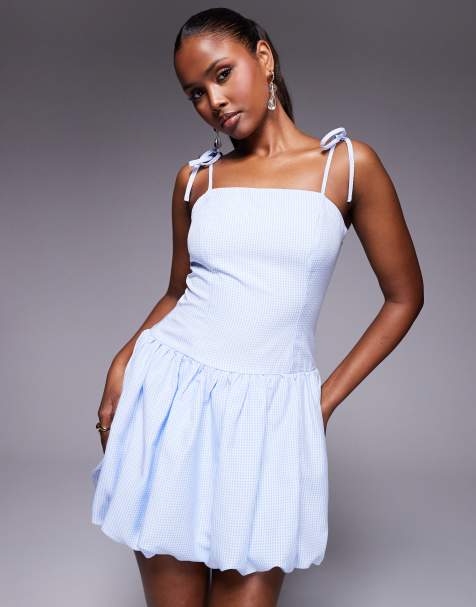 Vestido corto a cuadros vichy azules con tirantes anudados y falda abullonada exclusivo de Kaiia - view 1