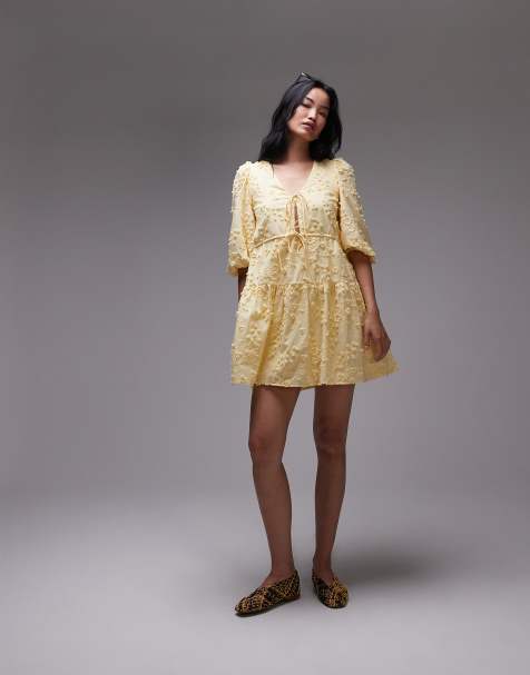 Vestido corto amarillo con bajo escalonado, bordados y detalle de lazadas delanteras de & Other Stories - view 1
