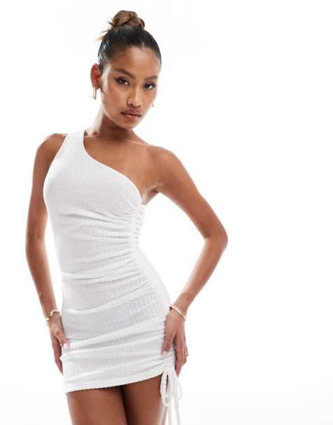 Vestido corto blanco asimétrico y fruncido de tejido texturizado exclusivo de Murci - view 1