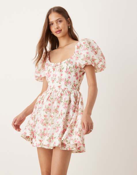 Vestido corto blanco de estilo mesonera con estampado floral y mangas abullonadas de For Love & Lemons - view 1