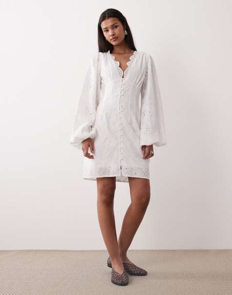 Vestido corto blanco hueso con bordados de Gina Tricot - view 1