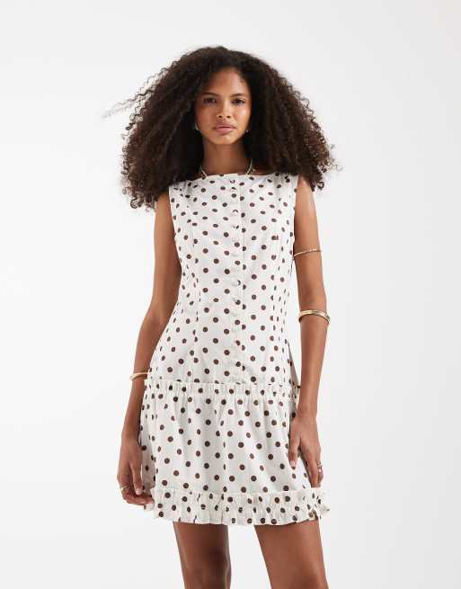 Vestido corto color crema abotonado con estampado de lunares de Neon Rose