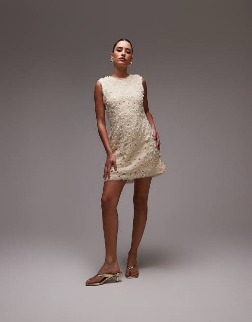 Vestido corto color crema de tul con diseño de cuentas y detalles calados de & Other Stories