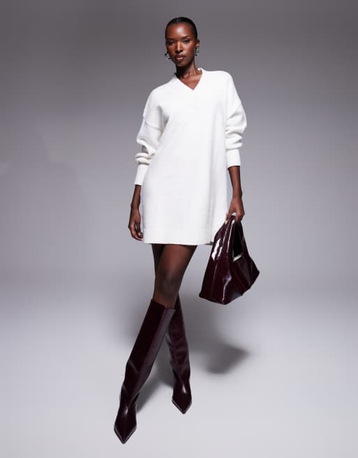 Vestido corto color crema estilo jersey extragrande con cuello de pico y mangas globo de punto de Aria Cove