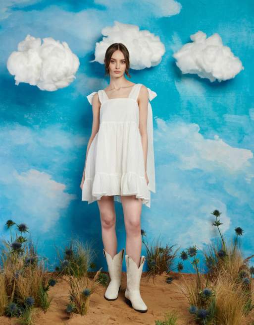 Vestido corto color marfil con lazos extragrandes en los hombros de Sister Jane