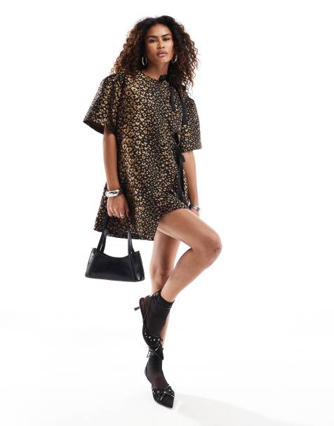 Vestido corto con estampado de leopardo y detalle de lazo de tejido texturizado de Ghospell - view 1