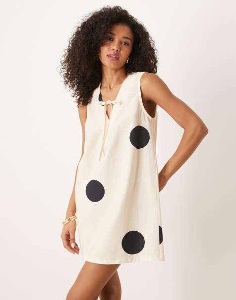 Vestido corto con estampado de lunares y lazada delantera de mezcla de lino de ASOS DESIGN - view 1