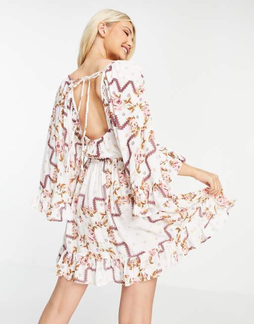 Vestido corto con estampado floral y mangas de estilo años 70 de ASOS DESIGN , 3 de 4