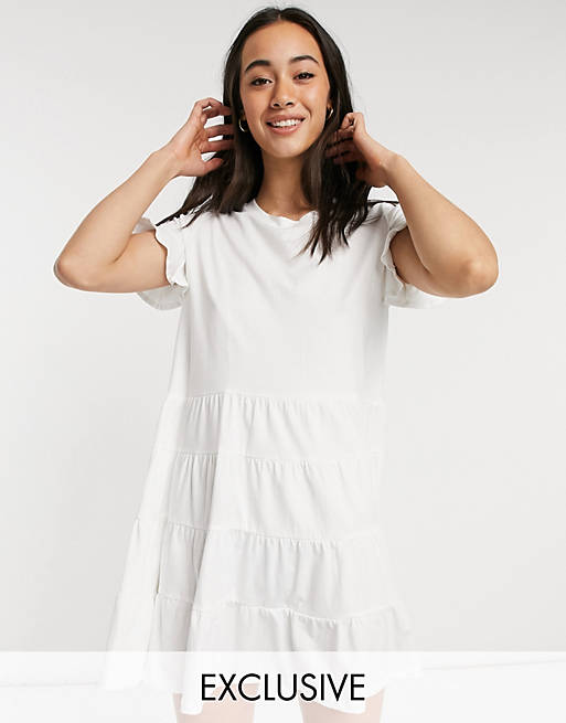Vestido corto de playa blanco a capas de punto exclusivo de Esmee