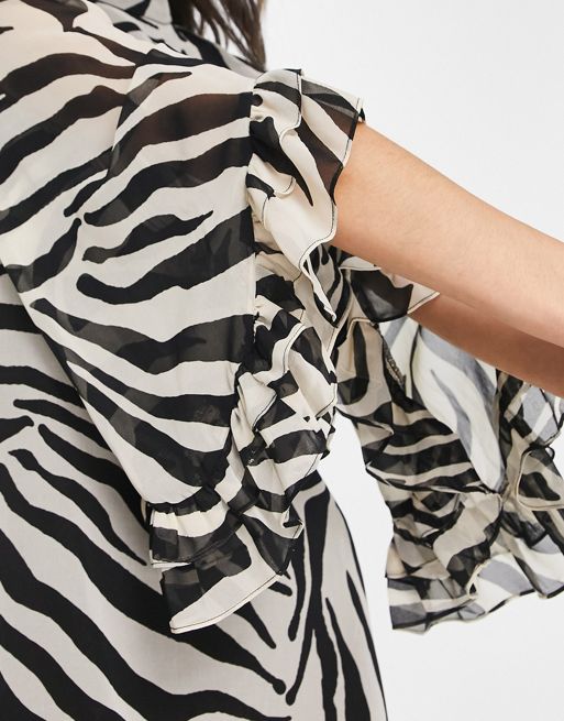 Blusa con estampado animal abstracto atada en la parte delantera con  detalle de volantes en la manga de tejido transparente de ASOS DESIGN