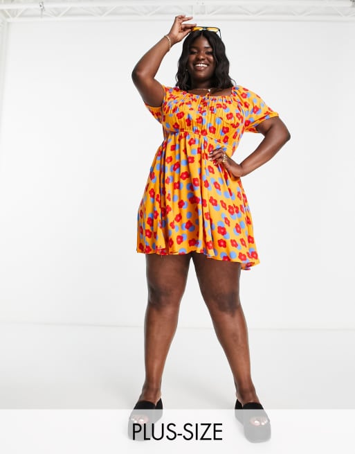 Vestido corto naranja con estampado floral retro y detalle en el pecho de Vila Curve