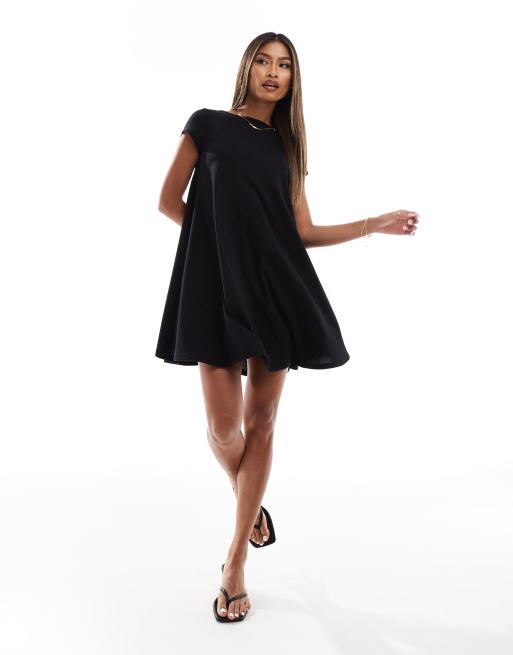 Vestido corto negro amplio con lazo con estampado de leopardo en la espalda de tejido texturizado de ASOS DESIGN