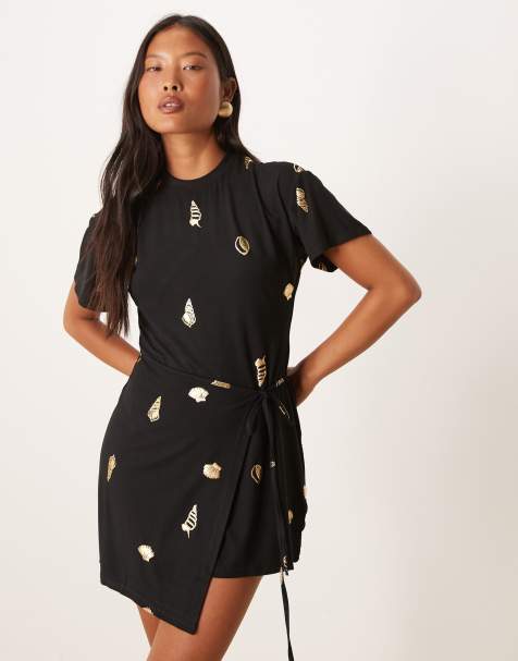 Vestido corto negro con conchas doradas de Never Fully Dressed Petite - view 1