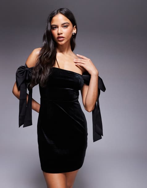 Vestido corto negro con escote Bardot y detalle de lazos extragrandes en los hombros de terciopelo exclusivo de Kaiia - view 1