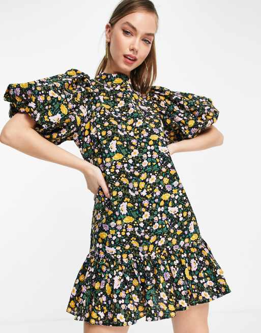Vestido corto negro con estampado floral y mangas abullonadas Figurative de Ghospell