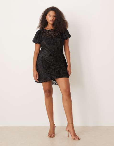Vestido corto negro con mangas abullonadas y estampado animal devoré de terciopelo de ASOS DESIGN Curve - view 1