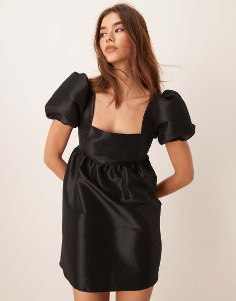 Vestido corto negro con mangas abullonadas y lazada en la espalda de ASOS DESIGN - view 1