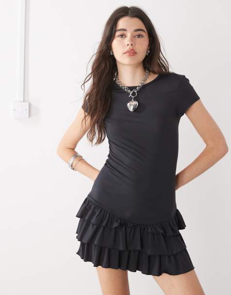 Vestido corto negro con volantes de COLLUSION - view 1