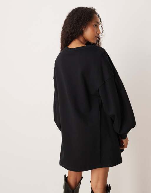 Vestido corto negro de corte trapecio de tejido de sudadera de