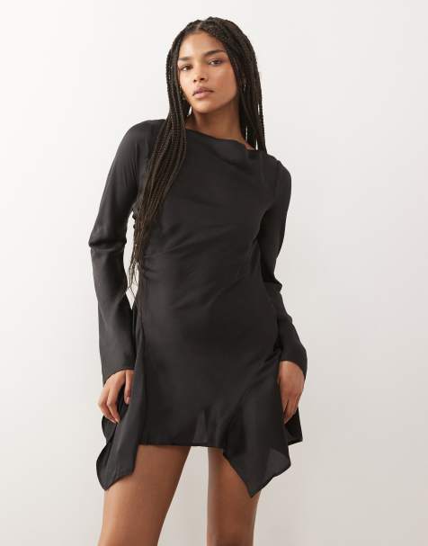 Vestido corto negro de manga larga con vuelo y espalda abierta con lazada de satén efecto rugoso de Monki - view 1