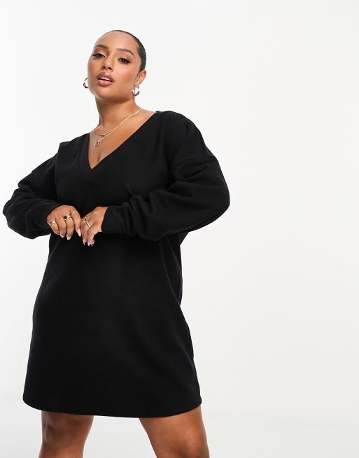Vestido corto negro estilo jersey holgado con cuello de pico de punto supersuave de ASOS DESIGN Curve