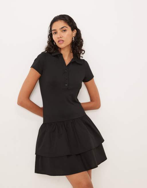 Vestido corto negro estilo polo de manga corta con volantes escalonados en la falda de ASOS DESIGN