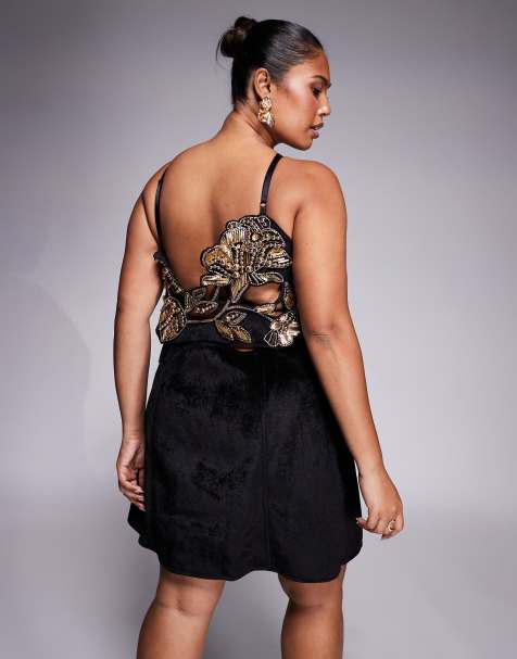 Vestido corto negro estructurado con diseño calado con abalorios de terciopelo de ASOS DESIGN Curve - view 1