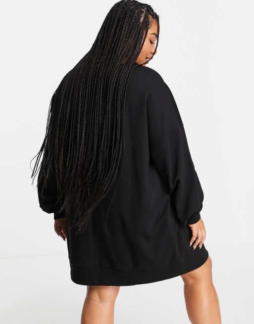Vestido corto negro extragrande estilo sudadera de ASOS DESIGN