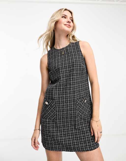 Vestido corto negro sin mangas de bouclé de New Look