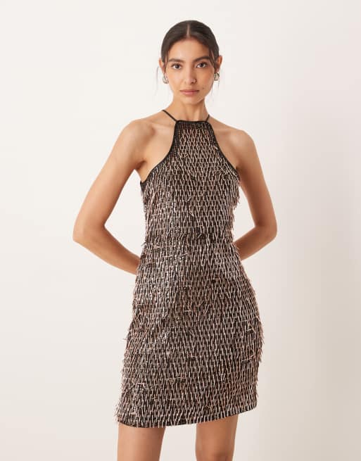 Vestido corto negro y dorado con diseño abierto de lentejuelas rizadas de Amy Lynn